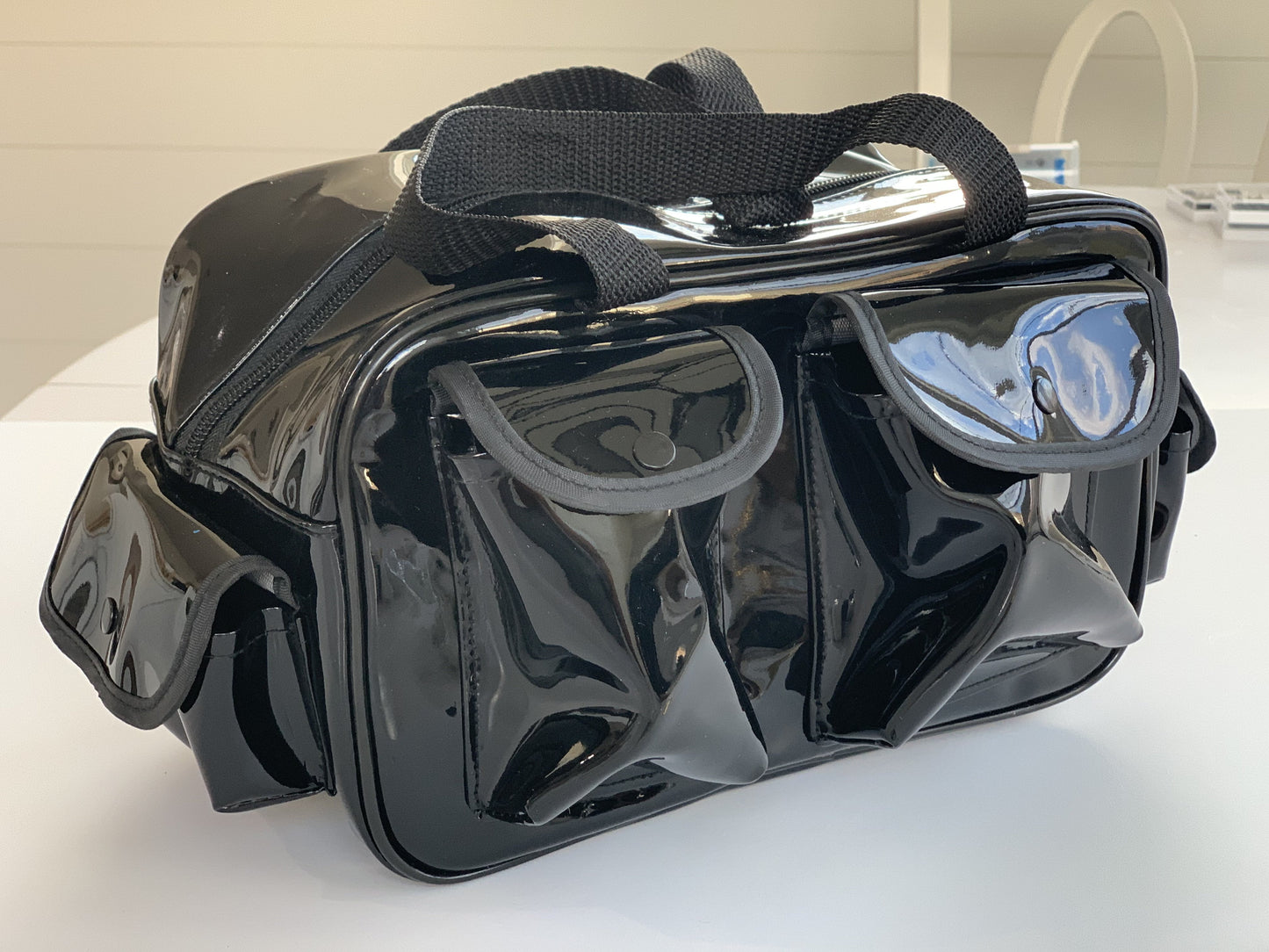 Image of Lash Travel Case from behind showing external Pouches