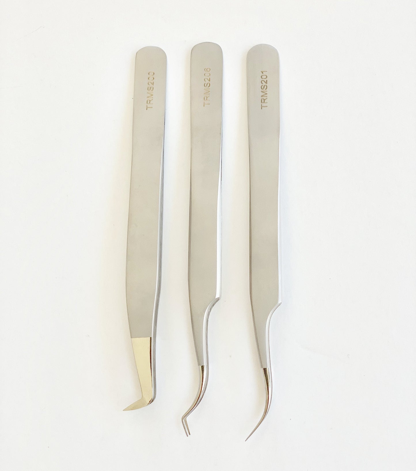 Image of all 3 tweezers included in this Volume Eyelash Extension Kit